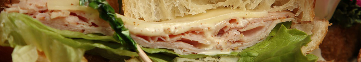 Eating Burger Sandwich Seafood at The Lobster Dock restaurant in Boothbay Harbor, ME.